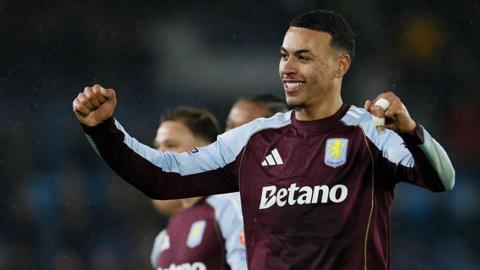 Morgan Rogers celebrates after Aston Villa's win at Leeds