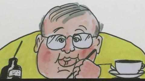 A cartoon self-portrait, showing Phil Woodford drawing with an ink pot on one side an a cup of tea on the other. He has grey hair and is wearing glasses and a yellow jumper.