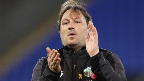 Craig Harrison applauds his team