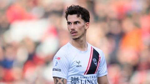 Lewis Montsma in action for Lincoln City