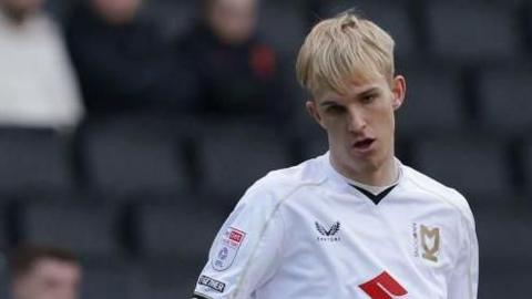 Charlie Waller in action for MK Dons