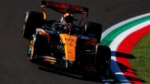 McLaren's Oscar Piastri turns into a left-hand corner during second practice for the Emilia-Romagna Grand Prix