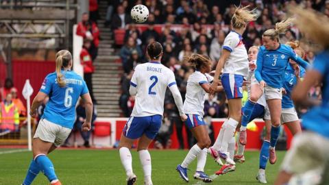 Sandra Jessen heads at goal