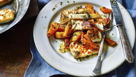 Plate of halloumi with knife and fork