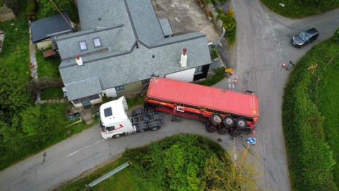 Lorry container on its side