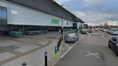 A street view image of an Asda supermarket as seen from the car park.