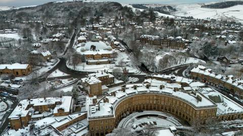 Buxton, with Buxton Crescent in the foreground, shown after snow has fallen.