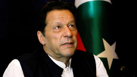 Former Pakistani Prime Minister Imran Khan pauses as he speaks with Reuters during an interview, in Lahore, Pakistan.