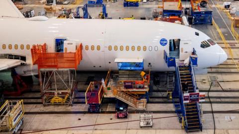 Boeing employees assemble 787s inside their main assembly building on their campus in North Charleston, South Carolina