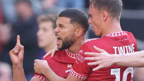 Nahki Wells celebrates scoring penalty