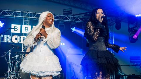 The members of Alt Blk Era perform on stage