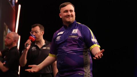 Luke Littler celebrates during his quarter-final match at the Premier League Darts 2024