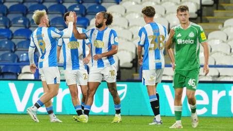 Huddersfield celebrate a goal against Newcastle United U21s
