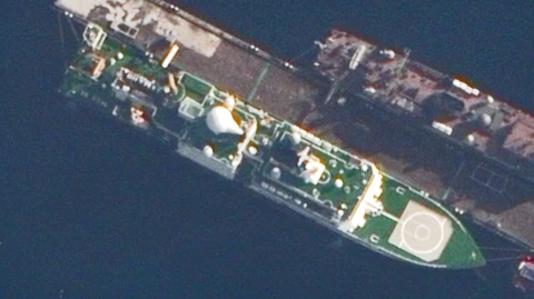 Handout composite image issued by the Ministry of Defence showing of surface and sub-surface GUGI-associated vessels based at Olenya Guba in Russia