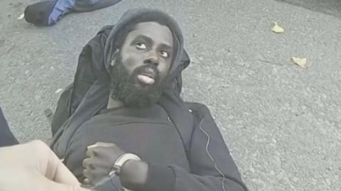 Valdo Calocane being arrested on 13 June 2023, after killing three people and running over three others with a van. 
