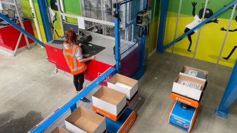 Woman working at a warehouse