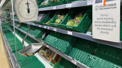 Empty shelves in a Co-op store