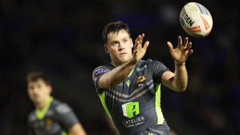 Catalans' Luke Keary receives a pass