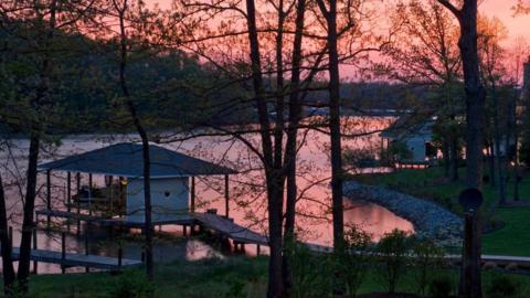 The sun sets over an unrelated dock at Smith Mountain Lake.