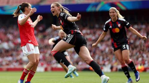 Jule Brand celebrates