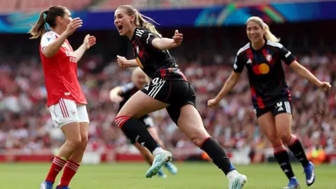 Jule Brand celebrates