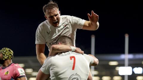 Nick Timoney and Stewart Moore celebrate a try