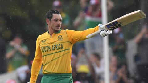 Quinton de Kock raising his bat for a century for South Africa