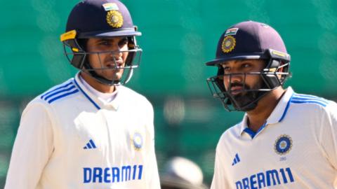 India openers Shubman Gill (left) and Rohit Sharma (right) talk