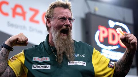 Simon Whitlock celebrates