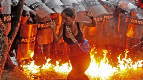 Venezuela's security forces have clashed with large crowds of protesters who've taken to the streets to denounce the re-election of President Maduro as fraudulent