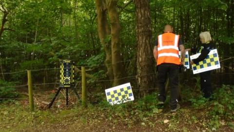 Police putting up CCTV and signs