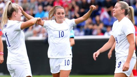 England's players celebrate scoring against Austria in a World Cup qualifier