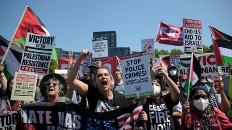 Pro-Palestinian demonstrators outside the Democratic National Convention  near the United Center in Chicago