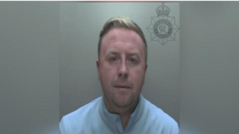 Police custody picture of Ryan Morris