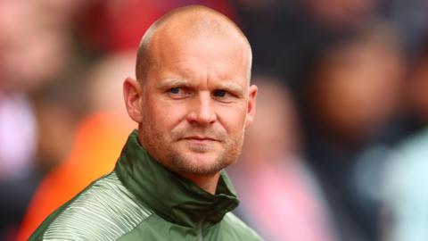 Norwich City manager Liam Manning looks on during his side's 1-1 draw with Stoke City