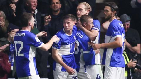 Birmingham players celebrate Jay Stansfield's penalty against Bolton