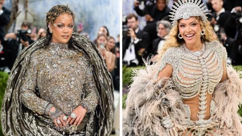 Rihanna wearing a silver dress and cape with Beyoncé smiling wearing a silver dress and spiked headdress