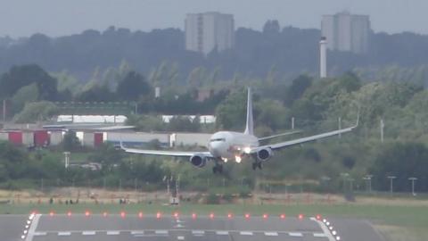 A plane landing at Birmingham Airport