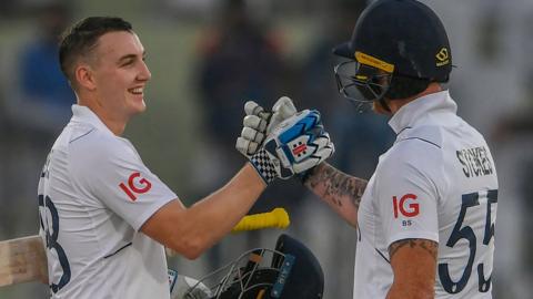 Harry Brook celebrates his century