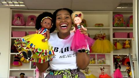 Khulile Vilakazi Ofosu with her dolls