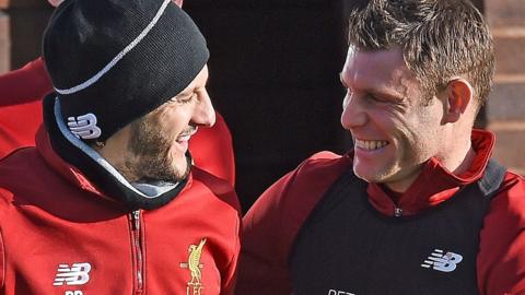 Adam Lallana (left) and James Milner at a Liverpool training session