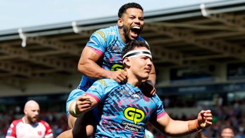 Wigan's Tyler Dupree celebrates his try