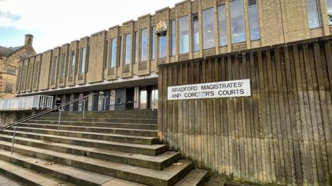 A photo of the steps and main entrance to Bradford Magistrates' Court.