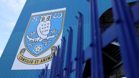 General view outside the stadium showing Sheffield Wednesday club badge 