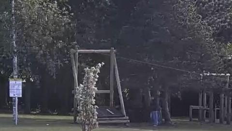 A CCTV screen grab of the park in Glenfield. It shows what appears to be young people damaging the zip line. 