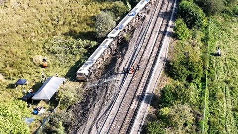 A birdseye view of the railway with the derailed train next to it - from last week.