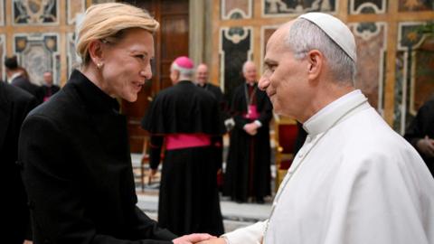 Pope Leo XIV meets with actor Cate Blanchett, during an audience with artists from the world of cinema in the Sala Clementina at the Vatican. 