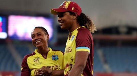 West Indies' Chedean Nation and Hayley Matthews celebrate beating Scotland at the Women's T20 World Cup