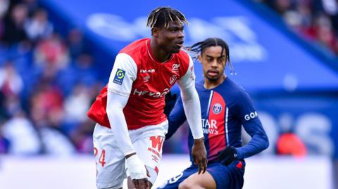 Emmanuel Agbadou playing for Reims in Ligue 1