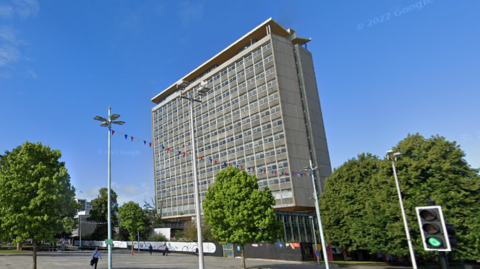 A tall concrete building 